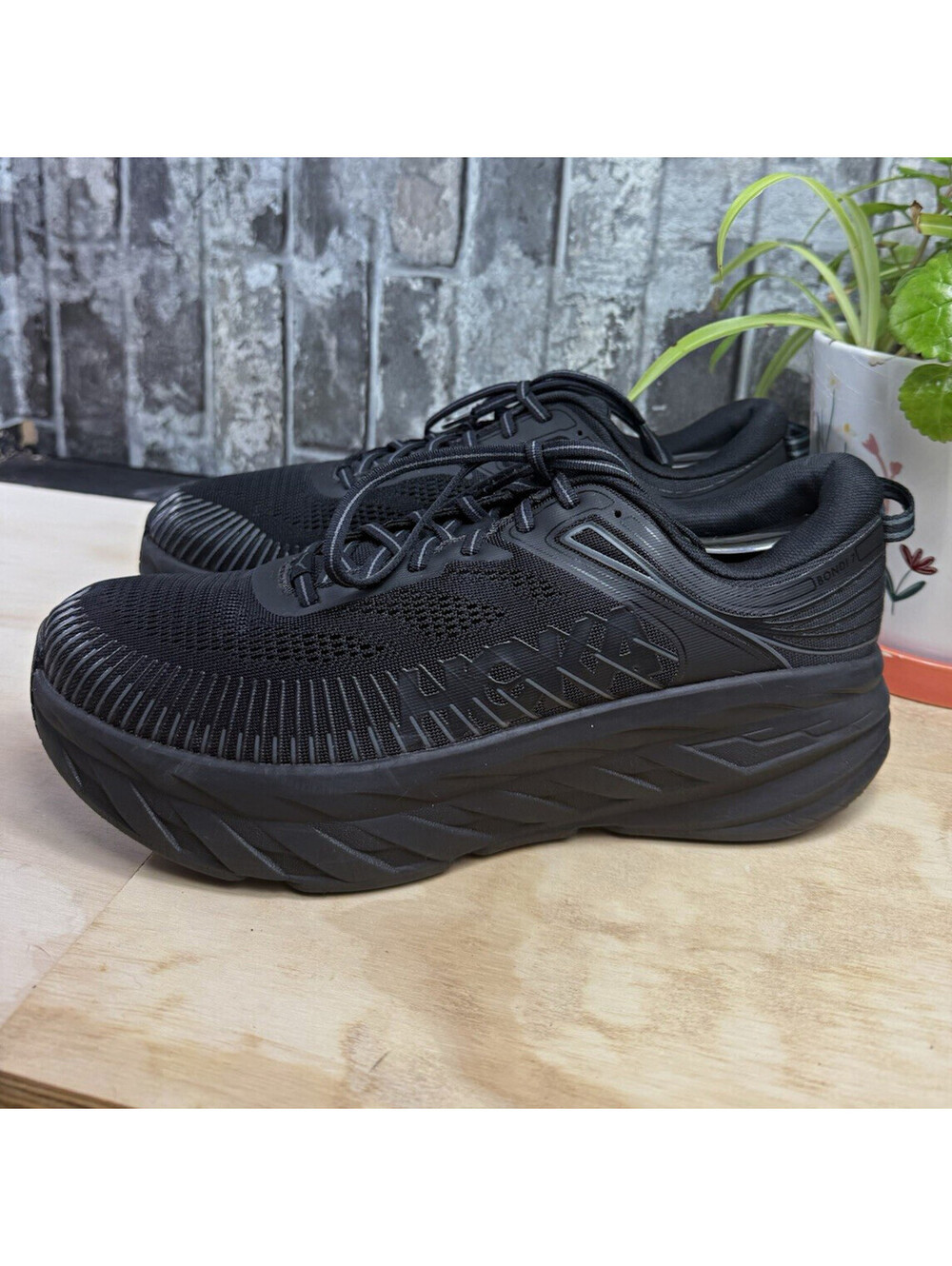 Hoka One One Bondi 7 Wide Men's Triple Black Low Top Lace-Up Sneaker 2E